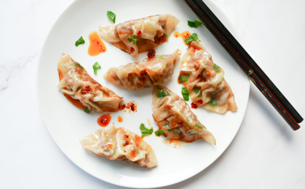 Chinese pork dumplings with chilli sauce