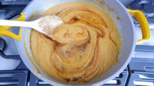 stirring soy sauce into katsu curry sauce - Cook Simply