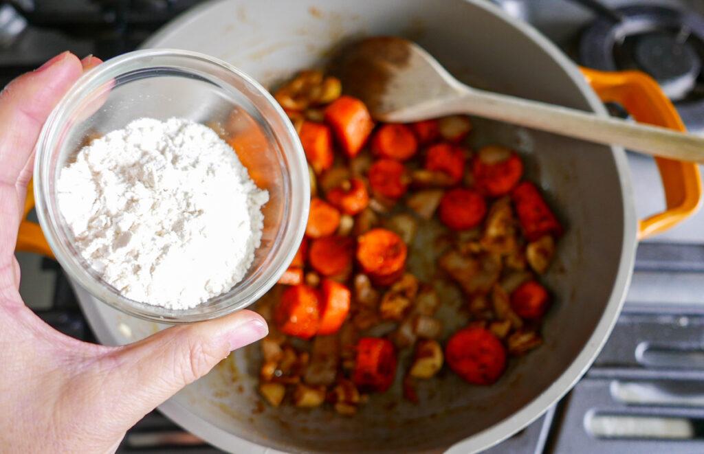adding flour to katsu sauce- Cook Simply
