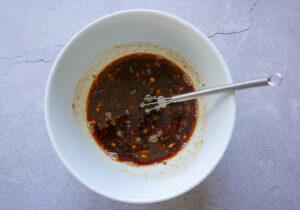 Mixing bourbon chicken ingredients for the sauce - Cook Simply