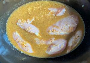 add stock to chicken curry - cook simply