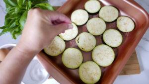 Salting aubergine rings - Cook Simply