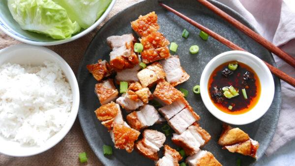 Chinese crispy pork belly in an air fryer with chilli sauce and green onions - Cook Simply