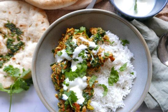 leftover turkey curry with steamed rice, naan and sprinkled with coriander and yoghurt - Cook Simply