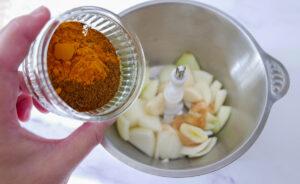 Adding spices to onions to make curry paste - Cook Simply