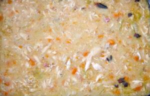 Adding water to the roasting tin and stock - Cook Simply