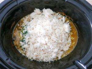 adding basmati rice to lamb biryani-Cook Simply