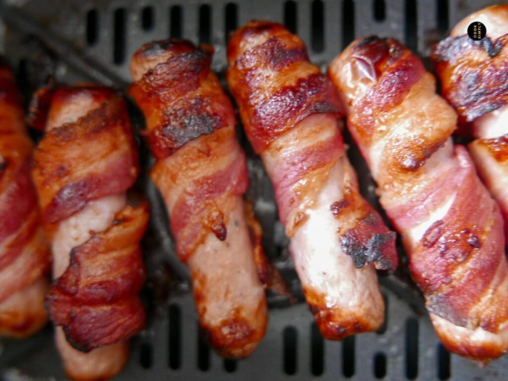 Pigs in blankets in air fryer basket - Cook Simply