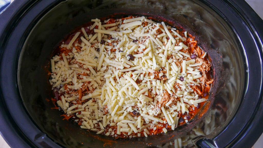 Grated cheese ready for melting slow cooker enchilada - Cook Simply