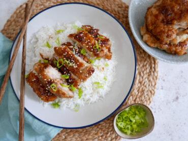 Crispy honey chicken with jasmine rice and sliced spring onions - Cook Simply